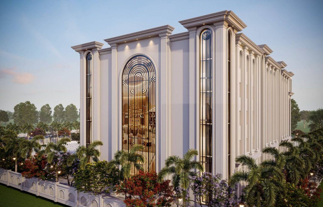 a Resort building at Bahraich with columns and a fence
